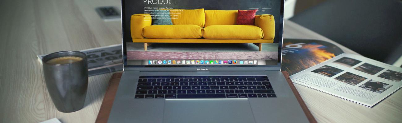 A laptop with an image of sofa.